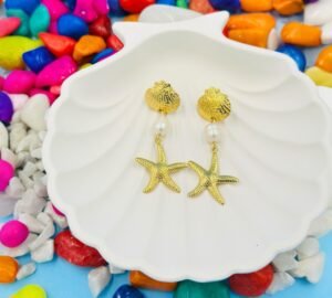 Coastal-inspired gold starfish and pearl long earrings, perfect for beachwear and tropical vacations.