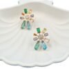 Star-shaped stud earrings adorned with multi-colour diamonds – a dazzling, hypoallergenic choice for your next evening out