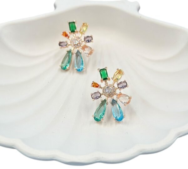 Star-shaped stud earrings adorned with multi-colour diamonds – a dazzling, hypoallergenic choice for your next evening out