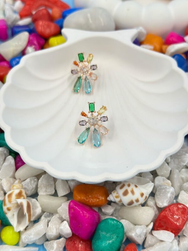 Star-shaped stud earrings adorned with multi-colour diamonds – a dazzling, hypoallergenic choice for your next evening out