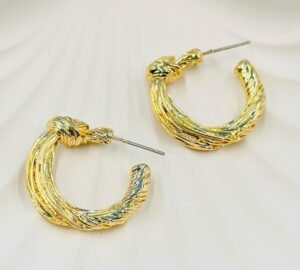 Classic small gold hoop earrings with a sleek, minimalist design