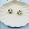 Elegant Korean-style rose earrings designed to add a soft, romantic touch to any outfit