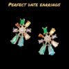 Star-shaped stud earrings adorned with multi-colour diamonds – a dazzling, hypoallergenic choice for your next evening out