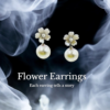 Elegant silver color drop earrings with a lustrous pearl finish