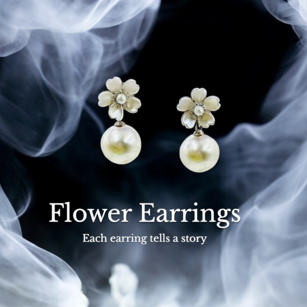 Elegant silver color drop earrings with a lustrous pearl finish