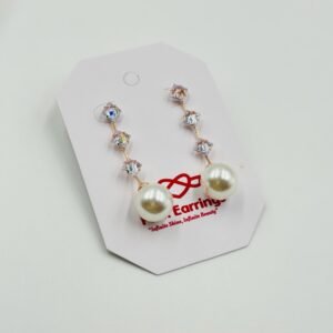 Stylish long square diamond chain accented with a radiant pearl Earrings