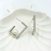 Rectangle-shaped half hoop earrings in silver, adorned with sparkling diamonds and a luminous pearl