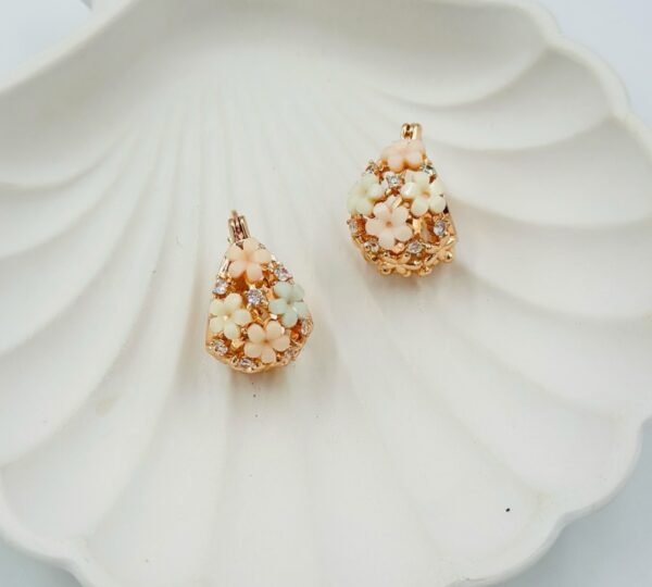Romantic flower basket hoops featuring soft nude floral accents