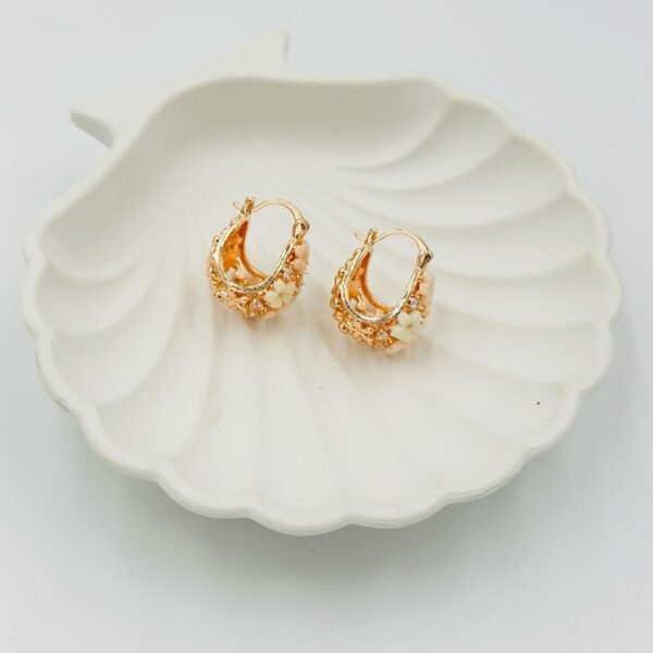 Romantic flower basket hoops featuring soft nude floral accents