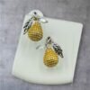 Tropical-inspired pineapple yellow earrings