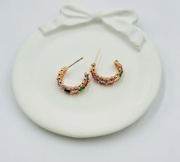 Stylish half hoop earrings featuring colorful square-cut diamonds