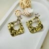 Glamorous Golden Starfall Statement Earrings